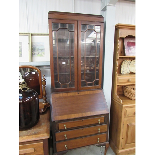 2263 - An Edwardian mahogany bureau bookcase on cabriole legs