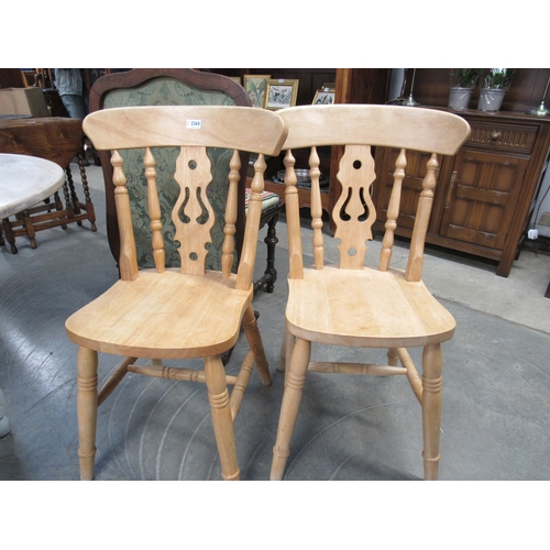 2265 - Four beech fiddle back chairs