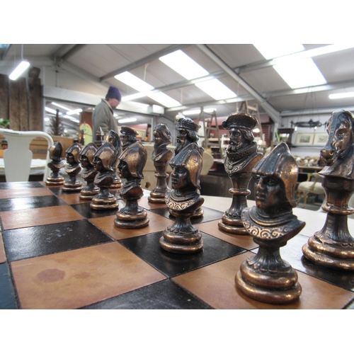 2268 - A vintage leather top chessboard with metal pieces