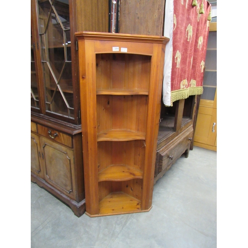 2354 - A modern pine full height corner cabinet