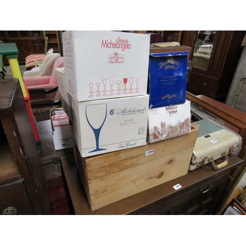 2399 - A box of model cottages and wine glasses