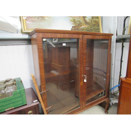 2416 - A 19th Century mahogany and glazed bookcase on a later cabriole legs, one lose