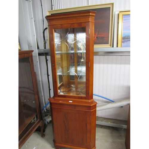 2417 - A yew wood corner cabinet