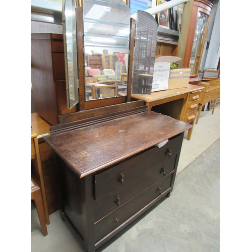 2420 - A 1930's oak dressing chest with three mirrors