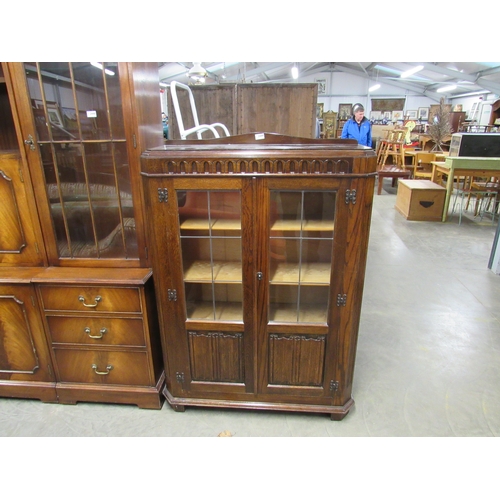 2449 - An oak linen fold bookcase