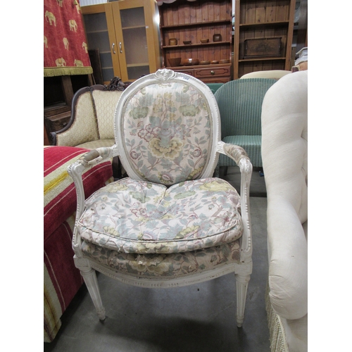 2458 - A 19th Century painted French fauteuil armchair with carved decoration on reeded tapering front legs