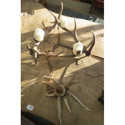 2011 - An antler three candle sconce hanging light