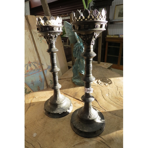 2012 - A pair of crown top candle sticks