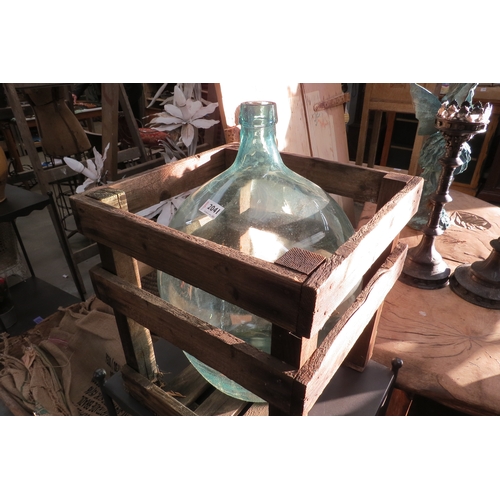 2041 - A glass carboy in crate