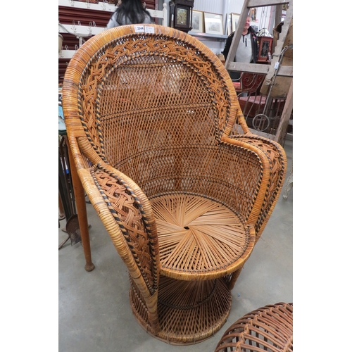 2044 - A vintage wicker 'Peacock' chair