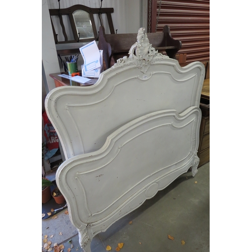 2107 - A painted French oak bed 140cm wide