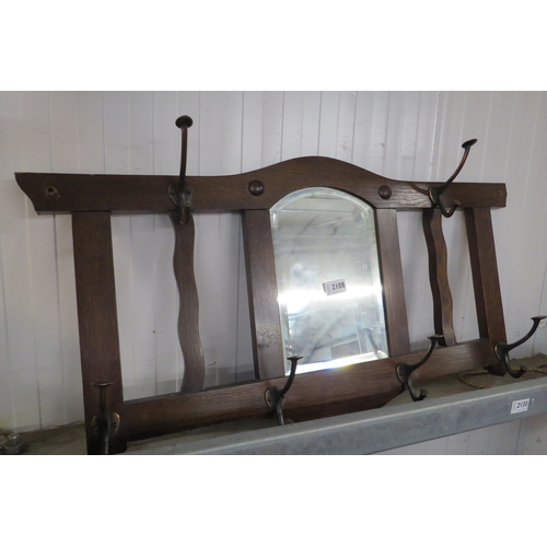 2108 - A 1930's oak wall mounting mirror and coat rack