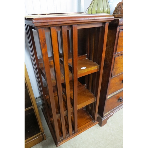 2128 - A mahogany revolving bookcase