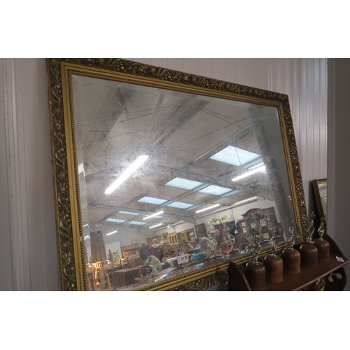 2135 - A gilt framed mirror 102 x 70cm