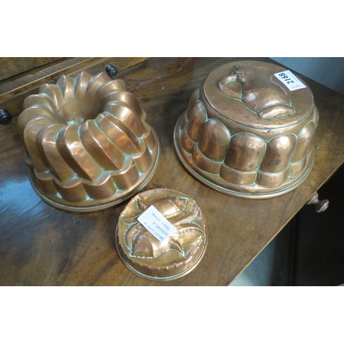 2168 - Three copper jelly moulds