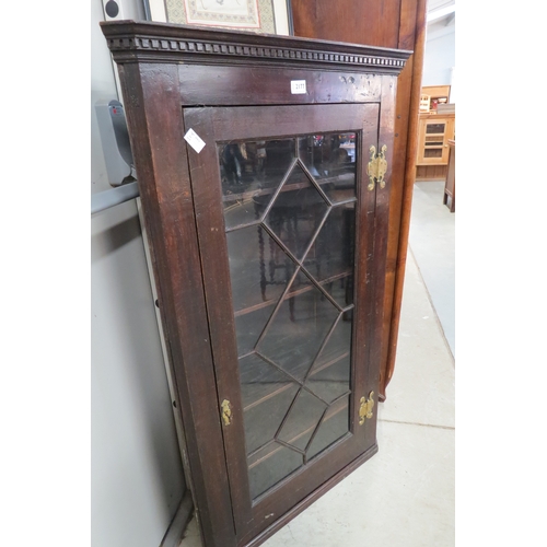 2177 - A 19th Century oak and astragal glazed corner cupboard