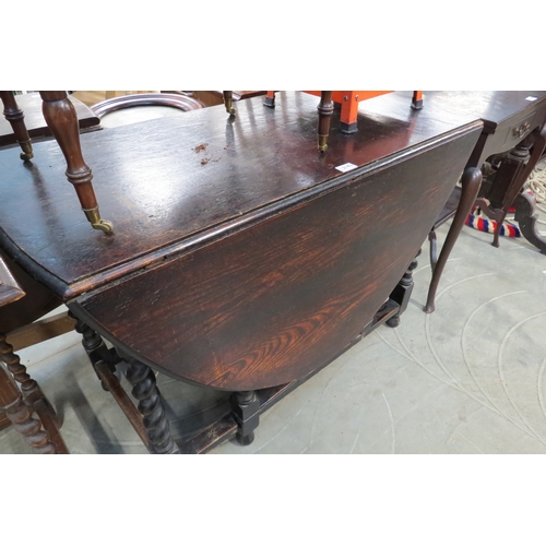 2183 - A 1930's oak barley twist gate-leg table