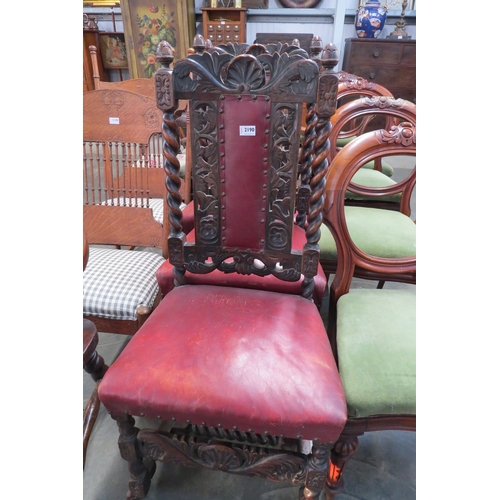 2190 - Three heavily carved oak hall chairs with red leatherette seats and backs