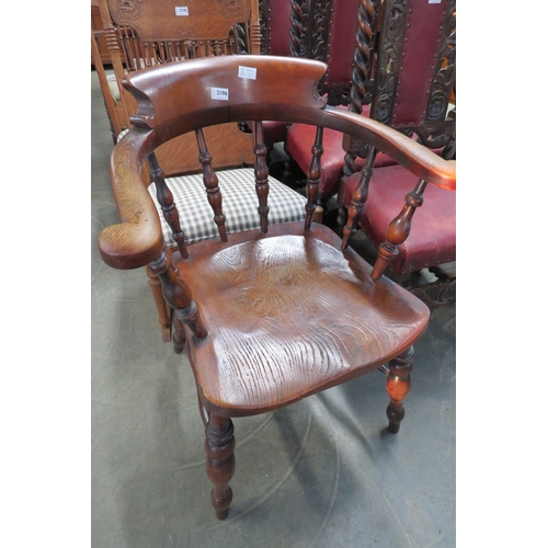 2196 - A Victorian elm seated Captain's chair