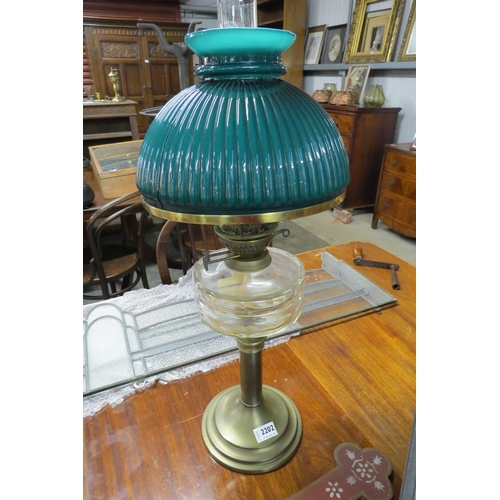 2202 - A Victorian brass and glass oil lamp