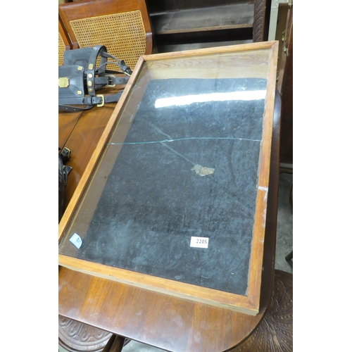 2205 - A pine table top display cabinet top cracked