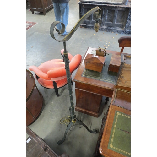 2216 - A pair of French wrought iron standard  with height adjustable stems