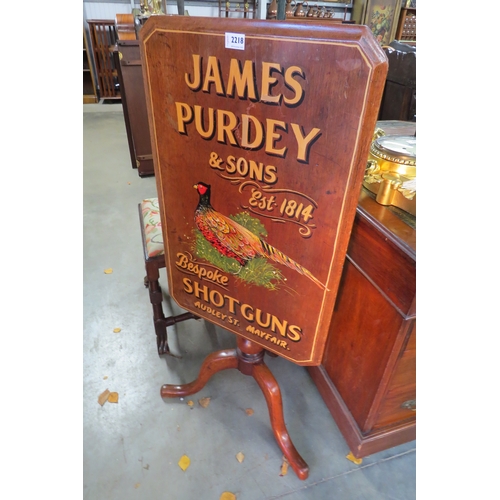 2218 - A 19th Century tilt top tripod wine table, the top painted James Perdey & Sons Shot Guns