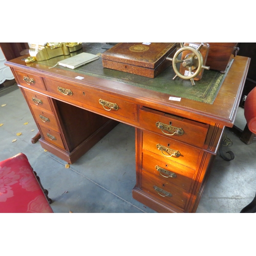 2224 - An Edwardian mahogany and worn leather desk and chair