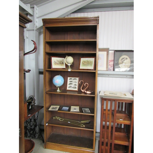 2119 - An Edwardian oak full height bookcase 228cm tall