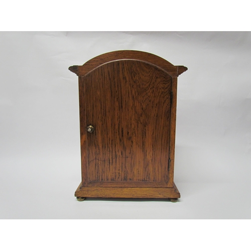 7766 - An early 20th Century oak cased Eureka clock with early electric movement and large balance wheel, A... 