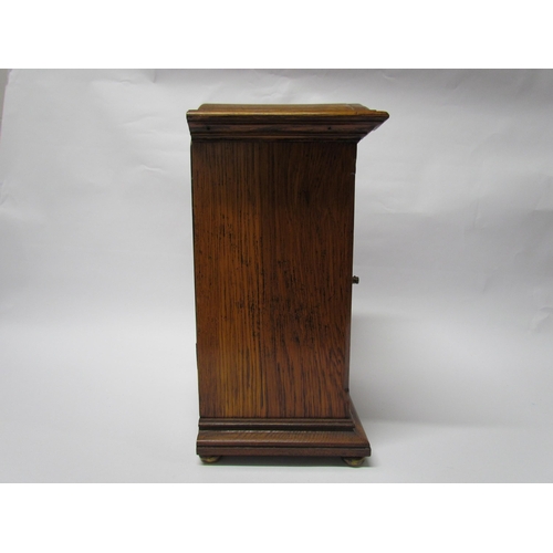 7766 - An early 20th Century oak cased Eureka clock with early electric movement and large balance wheel, A... 