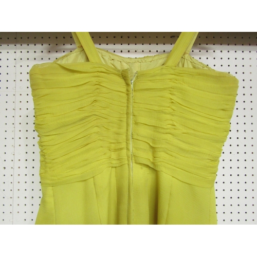 7837 - JEAN ALLEN: A superb vintage late 1950's early 1960's silk chiffon evening dress in chartreuse. The ... 