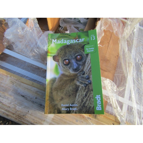 A pallet of boxed unused Bradt 13th edition books on Madagascar