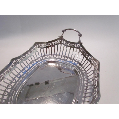 7451 - An Atkin Bros large silver openwork handled basket, Sheffield 1926, 600g, 29cm wide