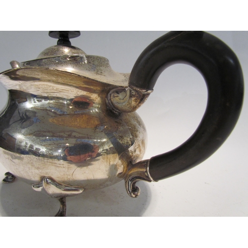 7452 - A Stewart Dawson & Co Ltd silver three piece teaset, teapot, scroll handle, hoof feet, 16cm tall x 2... 