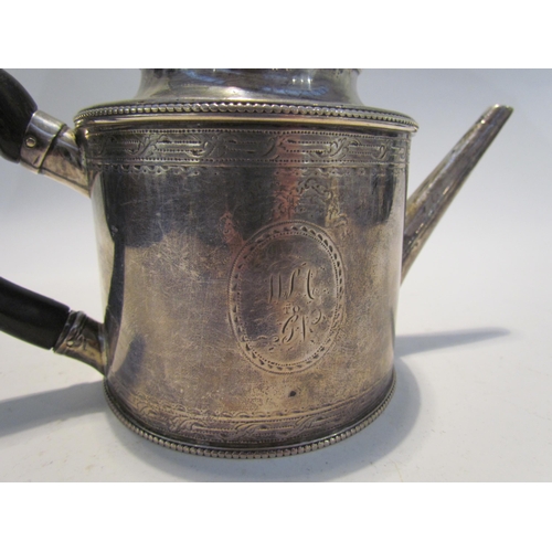 7455 - A George III silver teapot, possibly by Samuel Wood, barrel form with treen knop and handle, monogra... 