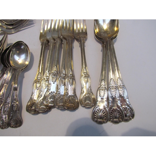 7469 - A quantity of Kings pattern silver flatware comprising of three serving spoons, six small forks, six... 