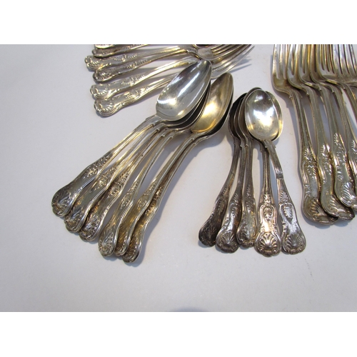 7469 - A quantity of Kings pattern silver flatware comprising of three serving spoons, six small forks, six... 