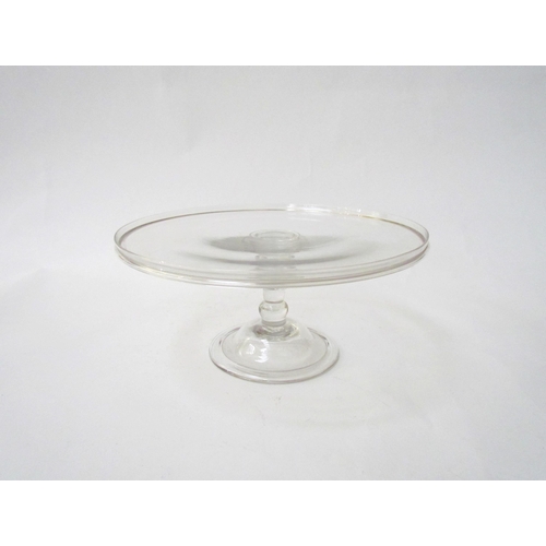 7483 - A Georgian clear glass footed tazza, 21cm diameter