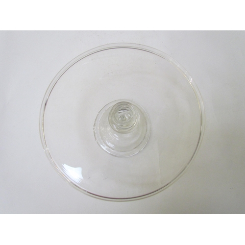 7483 - A Georgian clear glass footed tazza, 21cm diameter