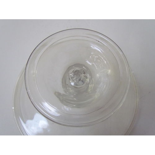 7483 - A Georgian clear glass footed tazza, 21cm diameter