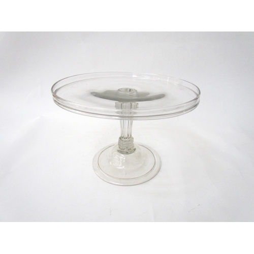 7486 - A Georgian clear glass footed tazza, fluted stem, 24cm diameter