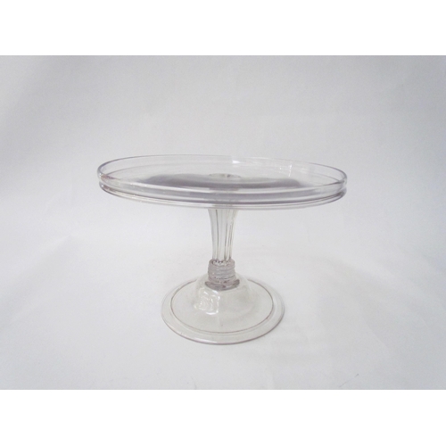 7486 - A Georgian clear glass footed tazza, fluted stem, 24cm diameter