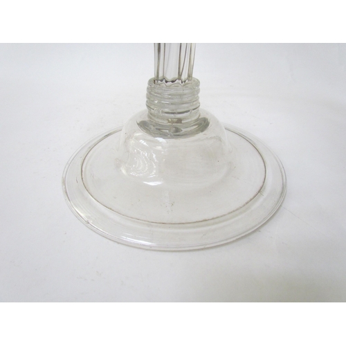 7486 - A Georgian clear glass footed tazza, fluted stem, 24cm diameter