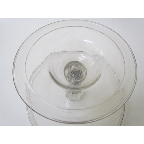 7486 - A Georgian clear glass footed tazza, fluted stem, 24cm diameter