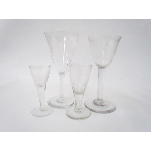 7487 - Two wine glasses one with cut glass band to rim, 16cm tall. A similar example with cut glass stem, 1... 