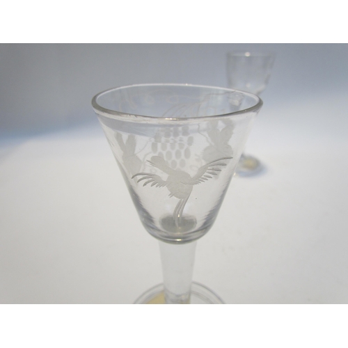 7489 - A cordial glass, the bucket bowl engraved with fruit vine and exotic bird, folded foot, 15cm tall, c... 