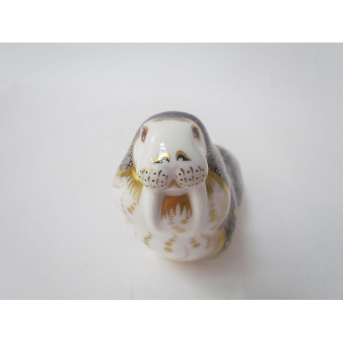 7490 - A Royal Crown Derby paperweight as a Walrus, gold stopper