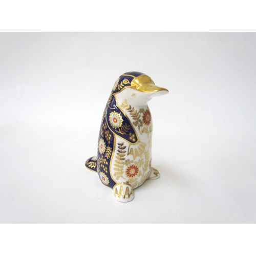 7492 - A Royal Crown Derby paperweight as a Platypus Duck, gold stopper