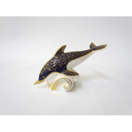 7495 - A Royal Crown Derby paperweight as a Dolphin, gold stopper